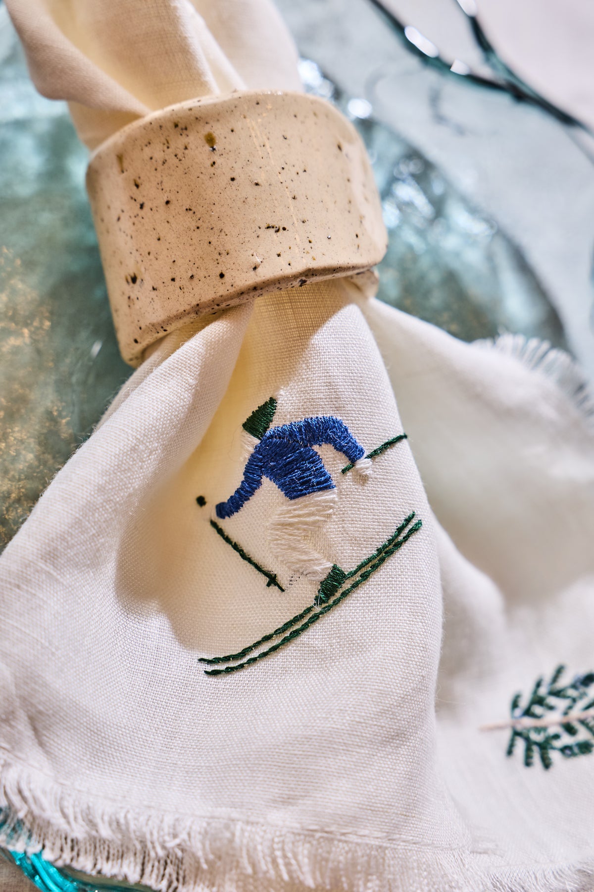 Set of Placemats Skier and Ceramic Napkin Rings bundle